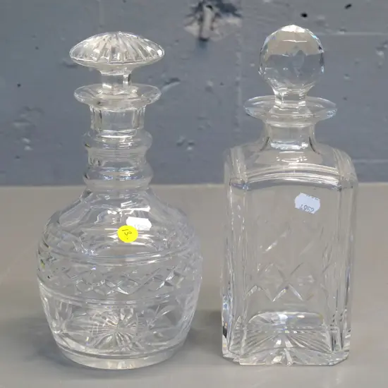 2 Stuart cut crystal stoppered decanters - taller is H-240