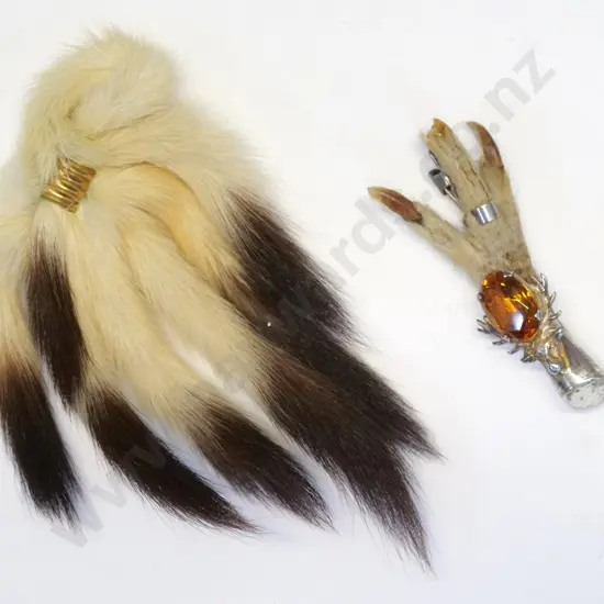claw brooch & a fur brooch