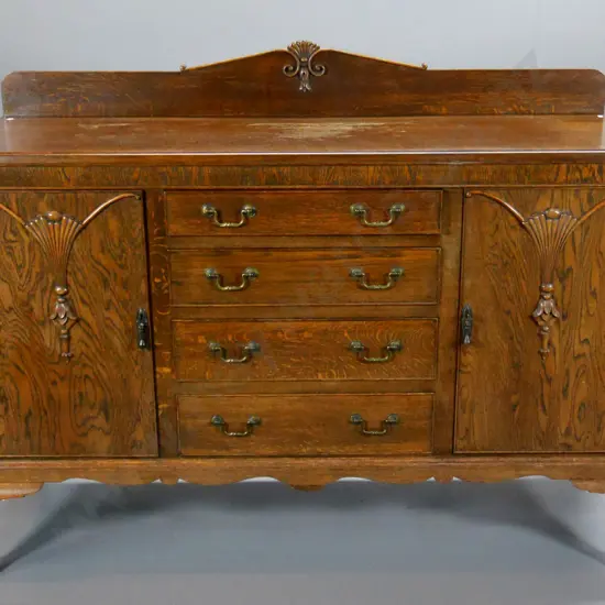 deco oak sideboard w/ carved detail, lockable w/key, 4 drawers, 1 cutlery lined, polish needs attention H1200 W1500 D490