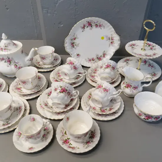 large collection of Royal Albert Lavender Rose pattern tea-ware including teapot, 8 trios, cake stand etc.