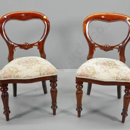 pair of reproduction mahogany balloon back chairs with carved rail, floral tapestry seat H890 W490 D420