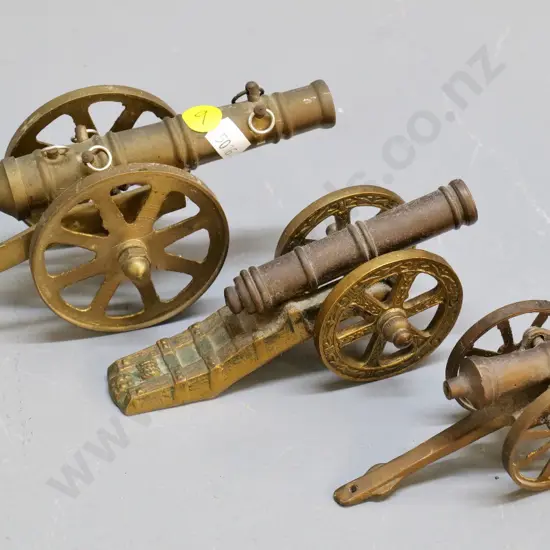 3 small cast brass model cannons - largest is H-70 L-180 W-75