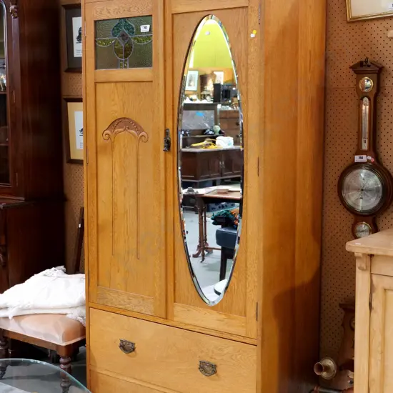 deco oak wardrobe w/bevelled oval mirror, leadlight pane, 2 door, 1 drawer, carved panel H1880 W930 D470