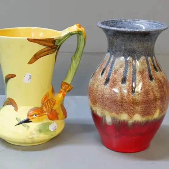 German pottery drip-glaze vase H-200 and a Burleigh bird-handled jug
