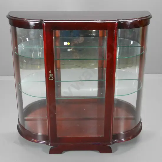 reproduction mahogany bow-front china cabinet; adjustable glass shelves, escutcheon & key, mirror back H1010 W1020 D370