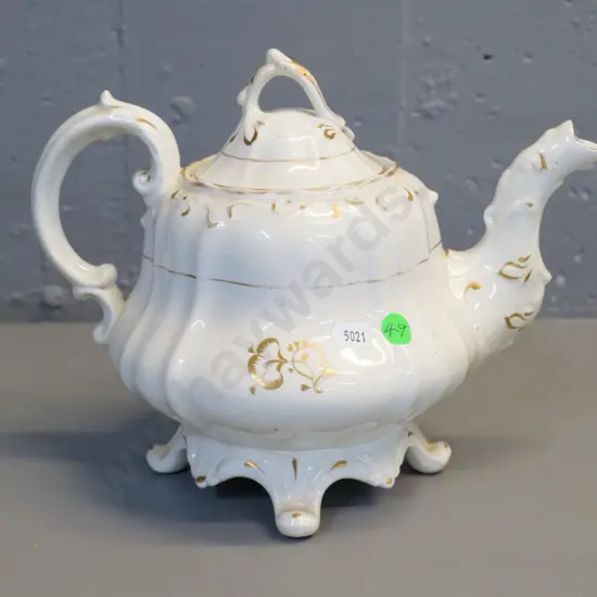 Staffordshire porcelain teapot - hairline crack to one foot H-190