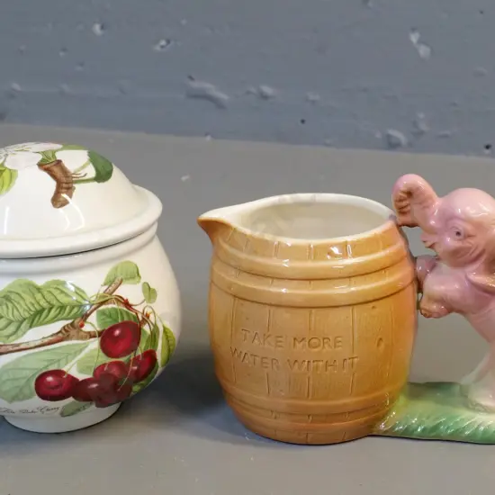 Hornby elephant-handled novelty jug and a Portmeirion Pomona lidded sugar bowl H-110