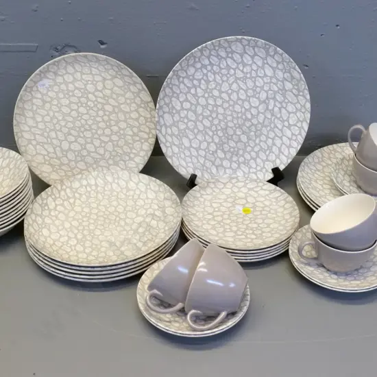 Poole pebble-design dinnerware - 5 sides, 4 dinner plates, 6 entrees, 6 cups & saucers, 10 desserts, etc.