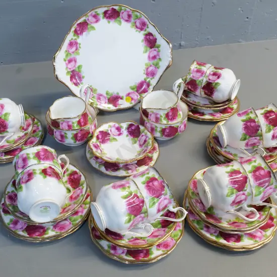 Royal Albert Old English Rose tea set - 12 trios, sweet dish, 2 creams and sugars - one cup is a different shape