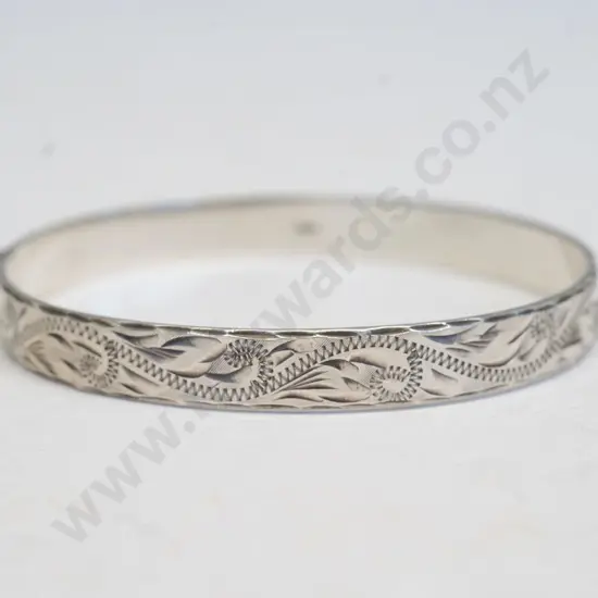 silver bangle one half with engraving stamped