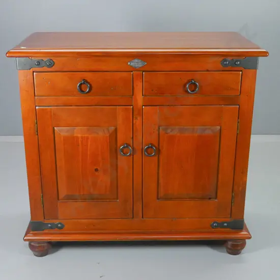 dark stained rimu nordic style sideboard with iron corner brackets and ring handles, ball feet H960 W1030 D520