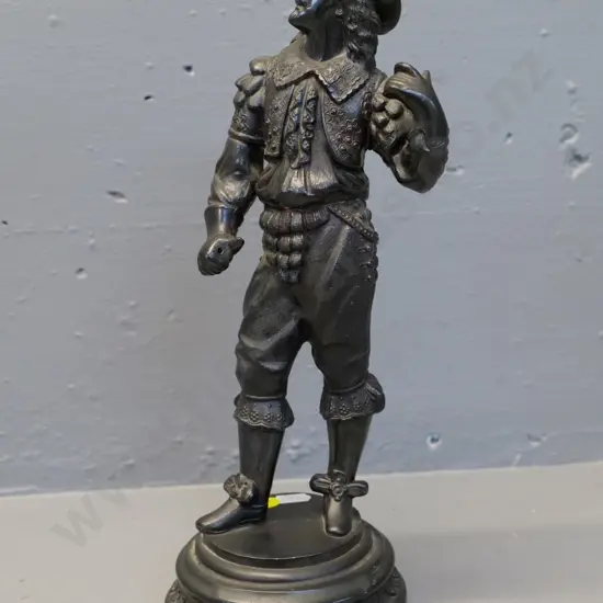 cast metal musketeer figure, missing sword, may have been repaired or modified H-320
