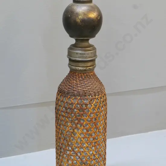 vintage soda syphon covered in cane - marked "By Royal Letters" H-390