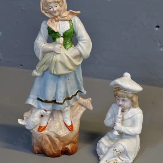 2 vintage figurines, no maker's marks - girl with hens H-250 and boy playing musical instrument