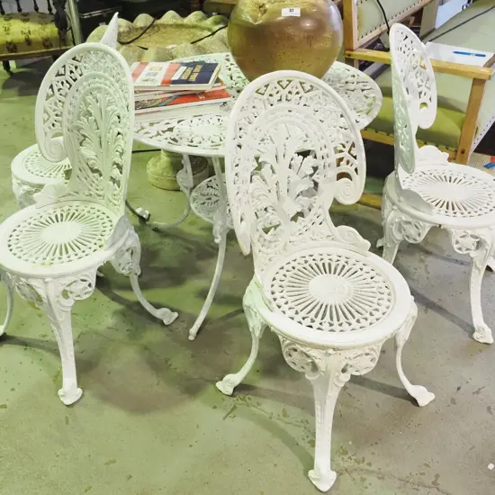 cast aluminium Victorian style outdoor table and 4 matching chairs, one with leg join repair H-650 D-850
