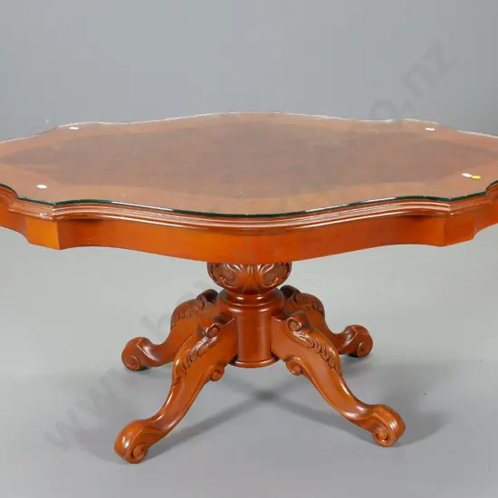 reproduction coffee table with burr walnut veneer scallop edge top, carved pedestal base, glass on top H490 L1030 W620