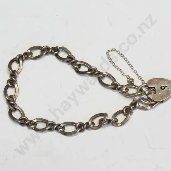 silver bracelet with heart clasp stamped silstg