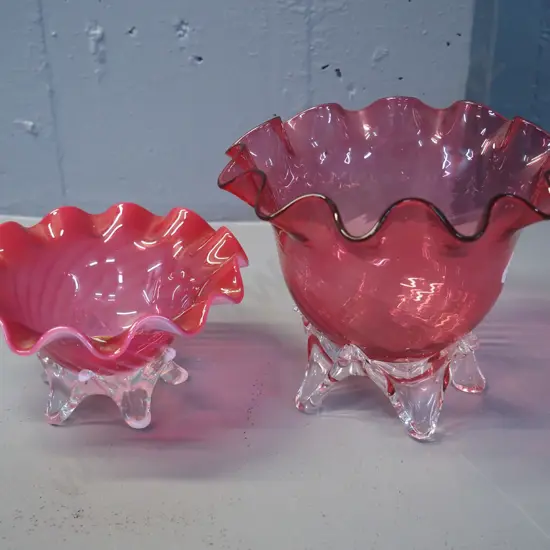 2 claret colour frilled glass footed bowls, one with milk glass and clear, one with clear base H-150 D-190
