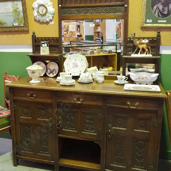 antique large heavily carved mirror-back sideboard: 3 door, 3 drawer, key, 1 leg needs repair H1860 W1500 D500