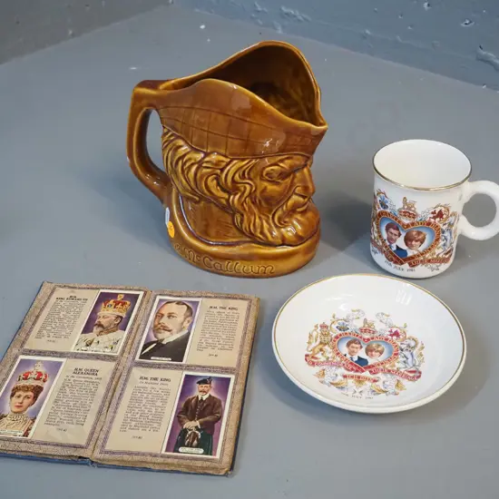 Crown Lynn McCallum jug No. 2119, Charles & Diana wedding mug and dish, George V jubilee cigarette cards in booklet
