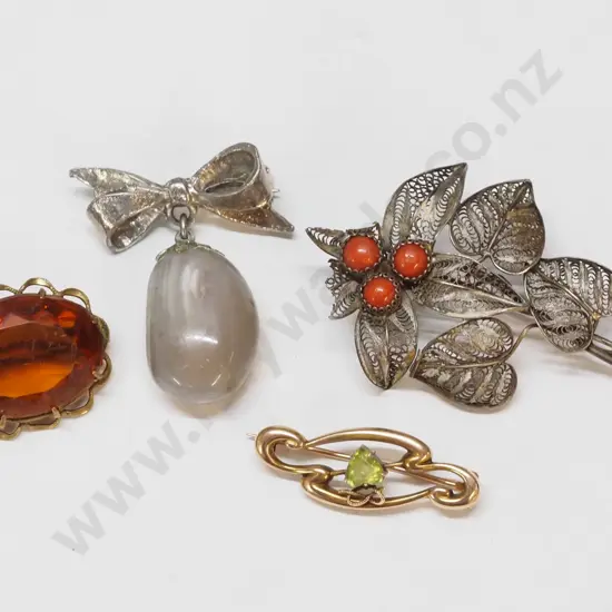 4 costume brooches