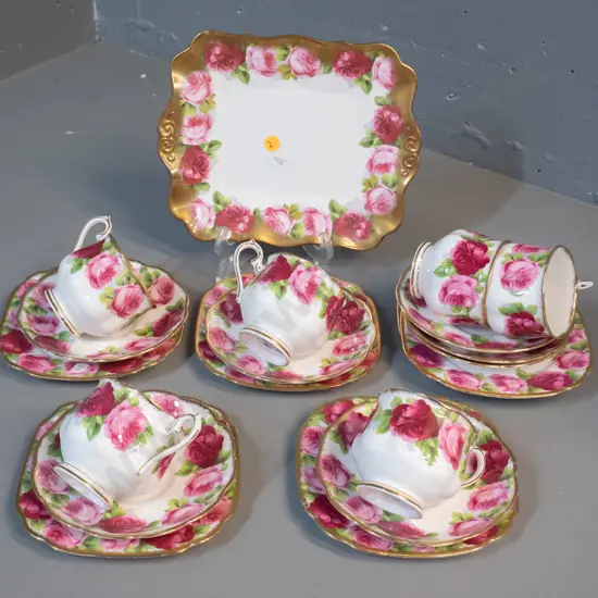 6 Royal Albert Old English Rose trios w/extra saucer and a cake plate with a chip