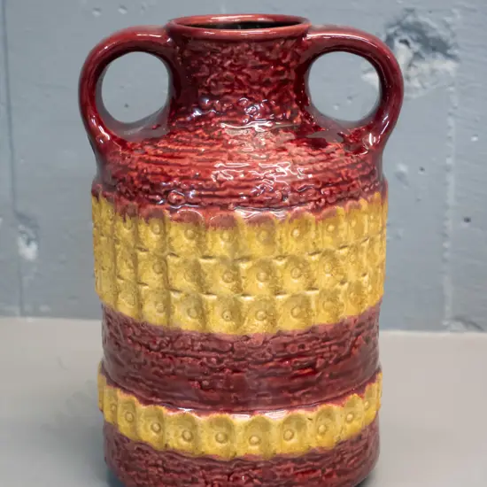 German pottery double handled vase - relief pattern burgundy & gold H240