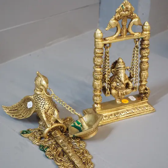 2 Indian gilded cast metal items - swinging figure ornament H-240 and a wall mount bird incense burner w/green residue