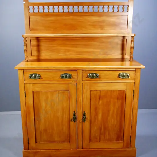 deco kauri sideboard w/ turned spindle pediment & shelf, 2 door, 2 drawer, brass handles, split on end H1650 W1220 D470