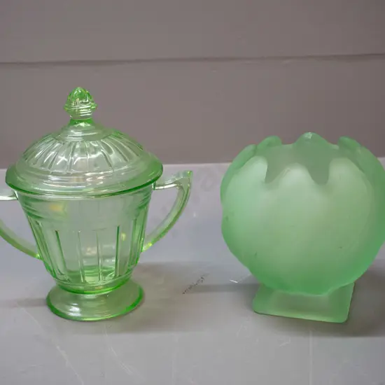 2 pieces green uranium glass - lidded sugar bowl H-140 W-135 and a lotus shape frosted vase