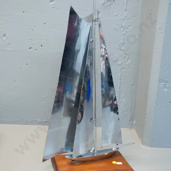 chrome yacht on mahogany base H-530 W-310 D-125