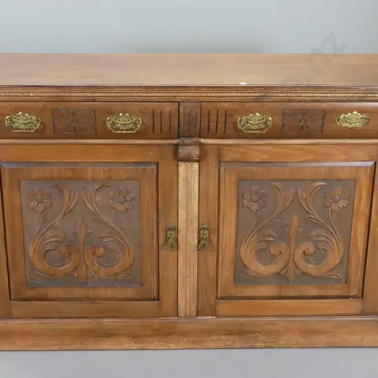 deco rimu sideboard with 2 carved doors, 2 drawers w/original drop handles, one missing drop H950 W1510 D540