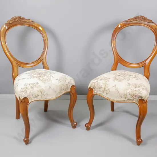 pair of Victorian carved balloon back dining chairs, faded floral tapestry, one has repair to back H900 W450 D410