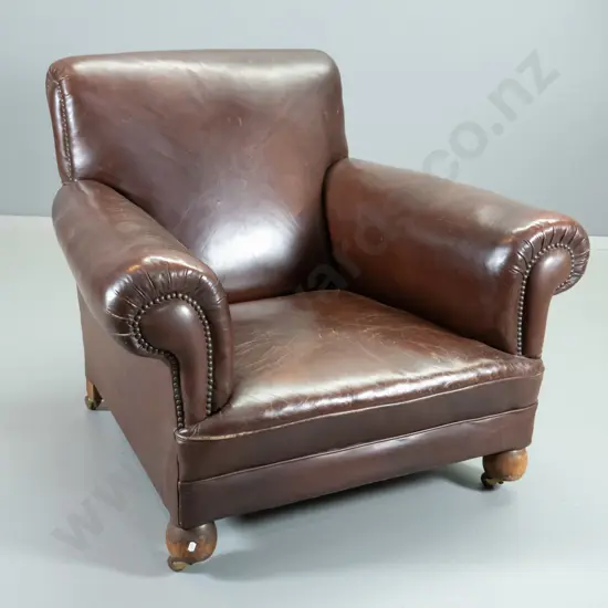 vintage leather club chair, studded arm fronts, ball feet & casters, some wear and cracking to leather H800 W960 D870