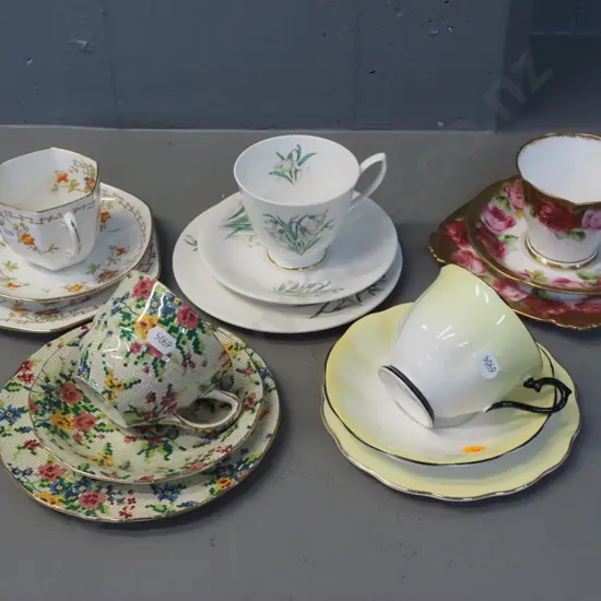 5 china trios - 4 Royal Albert and a Royal Winton Queen Anne all-over-floral