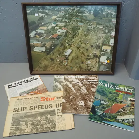 Abbotsford slip items - framed photograph, clippings, Star newspaper, booklets. Photo H-420 W-530