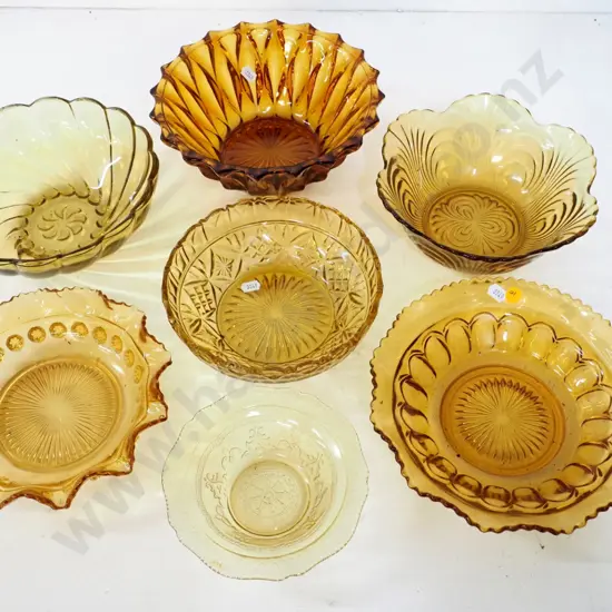 7 amber depression glass bowls - largest is D-230