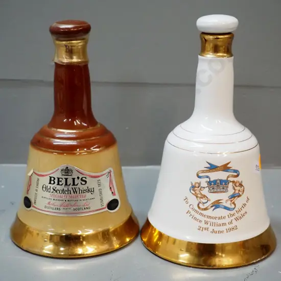 2 Wade porcelain Bell whisky decanters with contents - regular 375ml & 500ml birth of Prince William 1982 commemorative