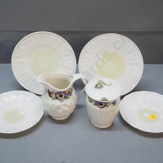 Belleek china items - pansy pattern cream and sugar and 4 green mark lustre items - 2 sides and 2 saucers, non matching