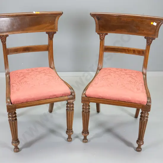 pair of Empire style mahogany w/flame veneer & carving on backs, pink damask fabric, one a bit loose in joints H880